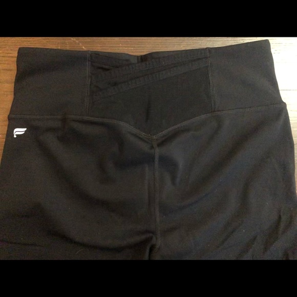 Fabletics black workout capris with back details. Motion365 Made by Fabletics. - Picture 3 of 4